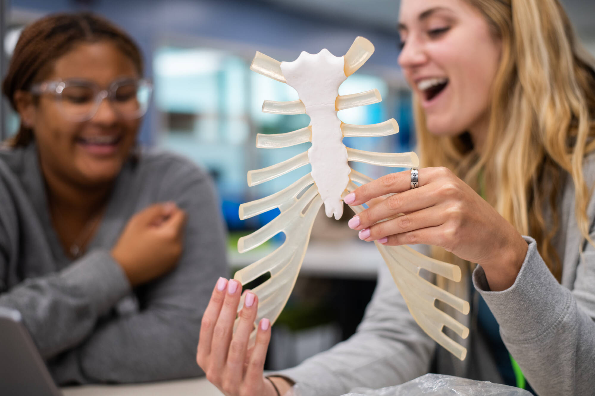 Madison Eye, right, tutors Makaela Harris, left, on anatomy and physiology in the new Tutoring and Reading Center in Henry Hall September 27.  (Photo releases on file)